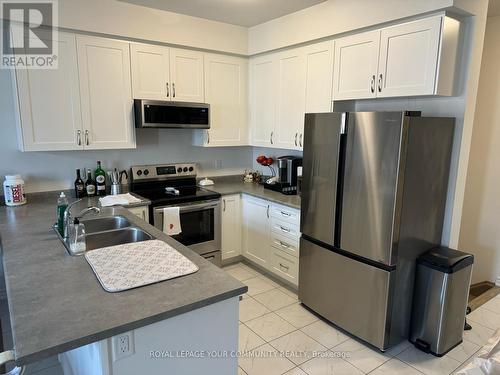 2248 Grainger Loop Road, Innisfil, ON - Indoor Photo Showing Kitchen With Double Sink