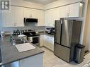 2248 Grainger Loop Road, Innisfil, ON  - Indoor Photo Showing Kitchen With Double Sink 