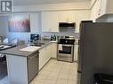 2248 Grainger Loop Road, Innisfil, ON  - Indoor Photo Showing Kitchen With Double Sink 