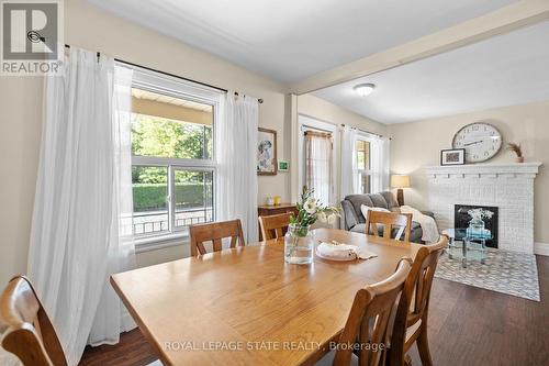 483 Dunsmure Road, Hamilton, ON - Indoor Photo Showing Dining Room With Fireplace