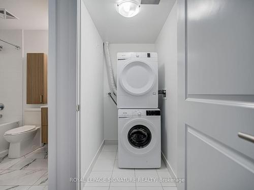 313-2799 Kingston Rd, Toronto, ON - Indoor Photo Showing Laundry Room