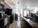 Cuisine - 301-4321 Rue St-Jacques, Montréal (Le Sud-Ouest), QC  - Indoor Photo Showing Kitchen With Double Sink 