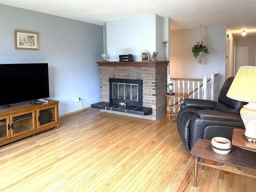 1590 Griffin Terrace, Kamloops, BC - Indoor Photo Showing Living Room With Fireplace