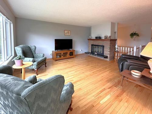 1590 Griffin Terrace, Kamloops, BC - Indoor Photo Showing Living Room With Fireplace