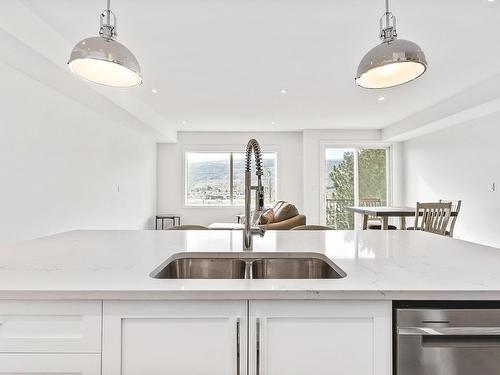 128 River Gate Drive, Kamloops, BC - Indoor Photo Showing Kitchen With Double Sink