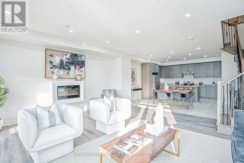 490 Silver Maple Road, Oakville, ON - Indoor Photo Showing Living Room With Fireplace