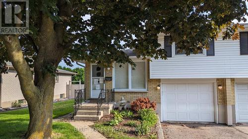 1117 Byron Baseline Road, London, ON - Outdoor With Facade