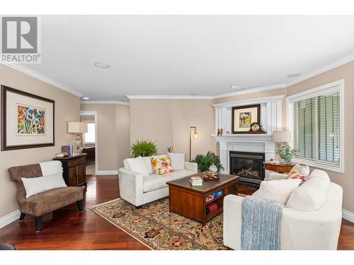 2365 Stillingfleet Road Unit# 207, Kelowna, BC - Indoor Photo Showing Living Room With Fireplace