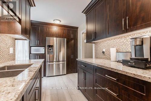 52 Tangle Briarway, Toronto, ON - Indoor Photo Showing Kitchen With Double Sink With Upgraded Kitchen