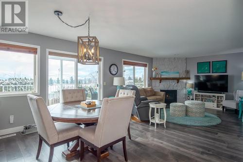 2440 Old Okanagan Highway Unit# 424, West Kelowna, BC - Indoor Photo Showing Dining Room With Fireplace