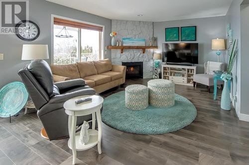 2440 Old Okanagan Highway Unit# 424, West Kelowna, BC - Indoor Photo Showing Living Room With Fireplace