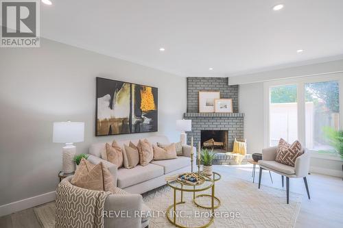 113 Simmons Boulevard, Brampton, ON - Indoor Photo Showing Living Room With Fireplace