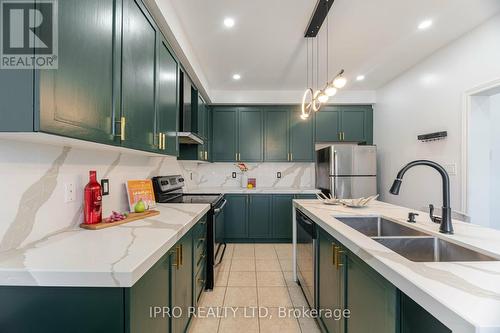 22 Jackson Drive, New Tecumseth, ON - Indoor Photo Showing Kitchen With Double Sink