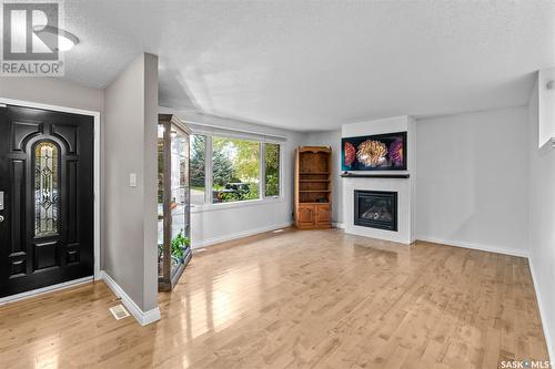 133 Churchill Drive, Saskatoon, SK - Indoor Photo Showing Living Room With Fireplace