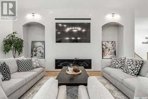 215 Edgemont Crescent, Corman Park Rm No. 344, SK - Indoor Photo Showing Living Room With Fireplace