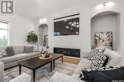 215 Edgemont Crescent, Corman Park Rm No. 344, SK - Indoor Photo Showing Living Room With Fireplace