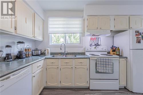 214 Maurice Crescent, Beresford, NB - Indoor Photo Showing Kitchen With Double Sink