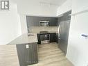 2305 - 20 Shore Breeze Drive, Toronto, ON  - Indoor Photo Showing Kitchen With Upgraded Kitchen 