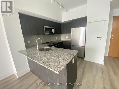 2305 - 20 Shore Breeze Drive, Toronto, ON - Indoor Photo Showing Kitchen With Double Sink