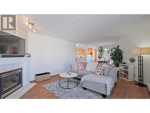 130 Abbott Street Unit# 312, Penticton, BC - Indoor Photo Showing Living Room With Fireplace