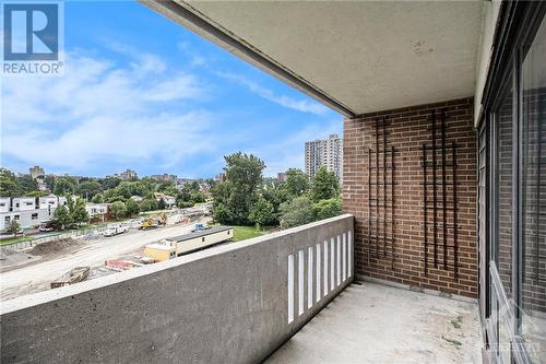 Covered south facing balcony. Future LRT at your doorstep. - 1100 Ambleside Drive Unit#607, Ottawa, ON - Outdoor With Exterior