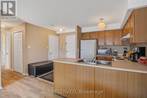 303 - 107 Bond Street, Orillia, ON - Indoor Photo Showing Kitchen With Double Sink