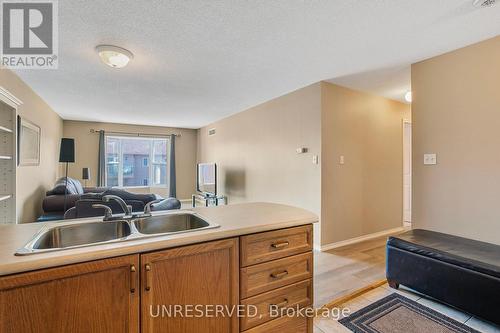 303 - 107 Bond Street, Orillia, ON - Indoor Photo Showing Kitchen With Double Sink