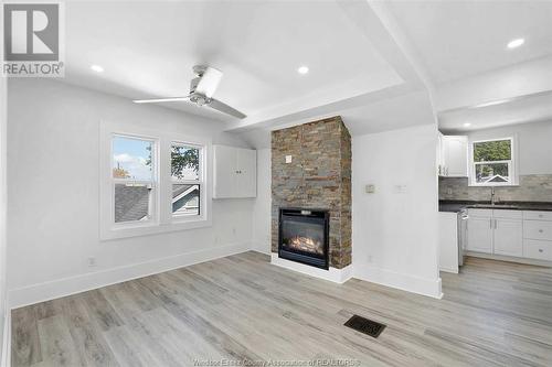 2260 Cadillac Street, Windsor, ON - Indoor Photo Showing Living Room With Fireplace