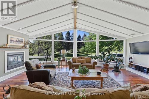 144 Old Mill Road, Kawartha Lakes, ON - Indoor Photo Showing Living Room With Fireplace