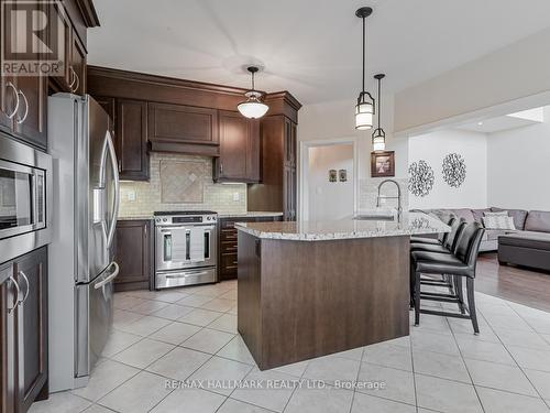 25 Keenan Drive, Adjala-Tosorontio, ON - Indoor Photo Showing Kitchen With Upgraded Kitchen