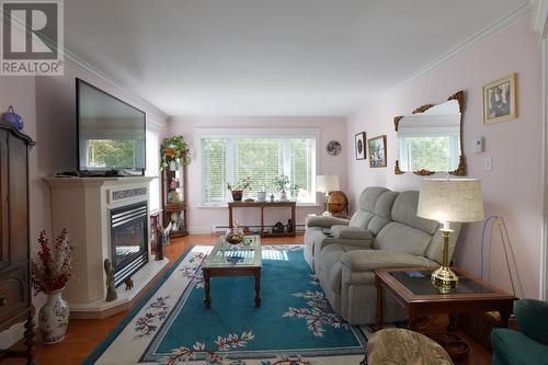 70 Camrose Drive, Paradise, NL - Indoor Photo Showing Living Room With Fireplace