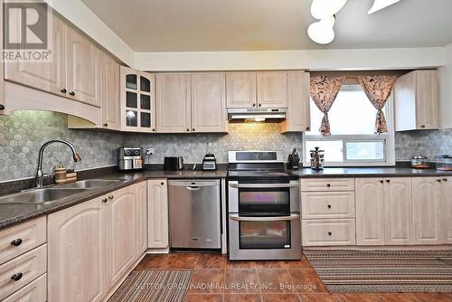 44 - 452 Silverstone Drive, Toronto, ON - Indoor Photo Showing Kitchen With Double Sink