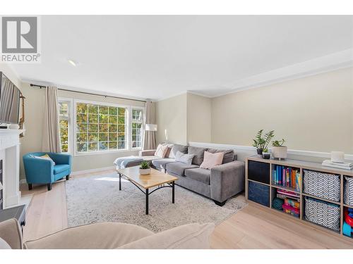 300 Murray Crescent, Kelowna, BC - Indoor Photo Showing Living Room With Fireplace