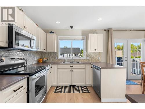 300 Murray Crescent, Kelowna, BC - Indoor Photo Showing Kitchen With Stainless Steel Kitchen With Double Sink