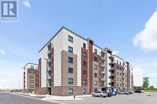 728 Brownstone Unit# 303, Lakeshore, ON - Outdoor With Facade