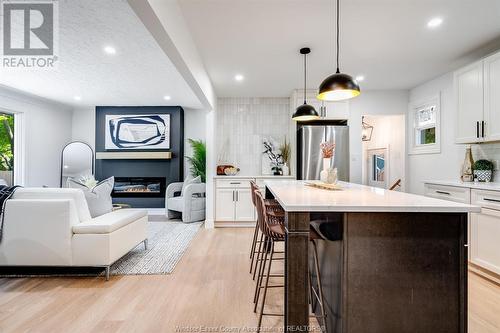 91 Woodlawn, Kingsville, ON - Indoor Photo Showing Kitchen With Fireplace With Upgraded Kitchen