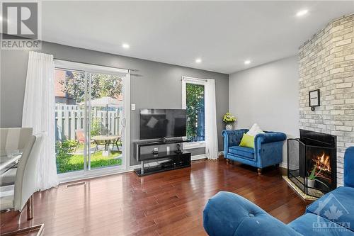 3333 Mccarthy Road Unit#19, Ottawa, ON - Indoor Photo Showing Living Room With Fireplace