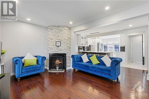 3333 Mccarthy Road Unit#19, Ottawa, ON - Indoor Photo Showing Living Room With Fireplace