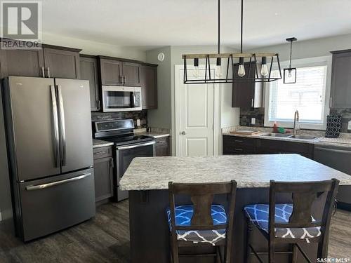 11111 Battle Springs Terrace, Battleford, SK - Indoor Photo Showing Kitchen With Double Sink