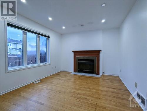 2112 Gardenway Drive, Ottawa, ON - Indoor Photo Showing Living Room With Fireplace