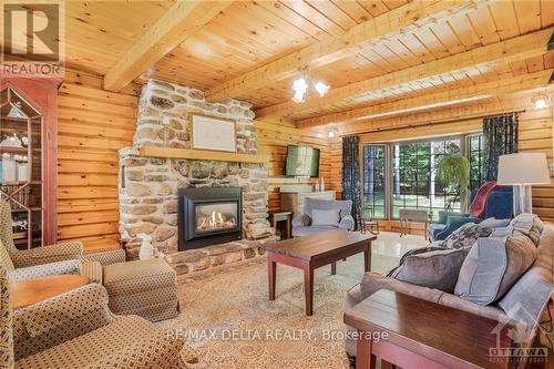 6758 Newton Road, Prescott And Russell, ON - Indoor Photo Showing Living Room With Fireplace