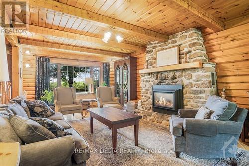 6758 Newton Road, Prescott And Russell, ON - Indoor Photo Showing Living Room With Fireplace