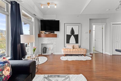 410-3521 Carrington Road, West Kelowna, BC - Indoor Photo Showing Living Room With Fireplace