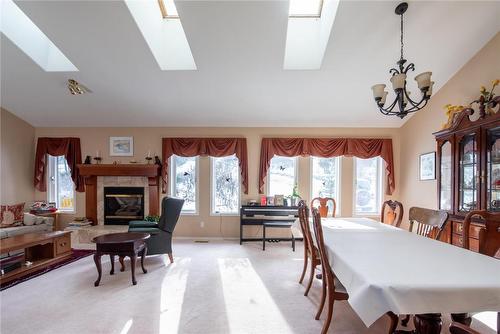 9292 Kokanee Road, Vernon, BC - Indoor Photo Showing Other Room With Fireplace