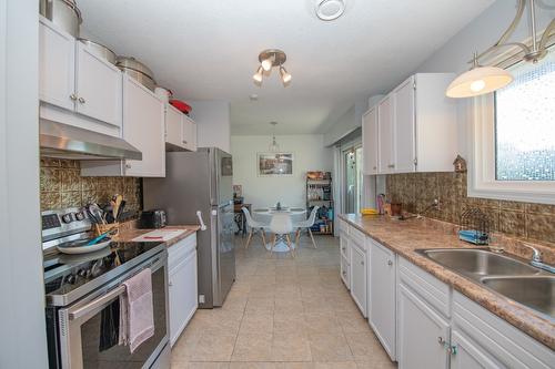 2110 Norris Avenue, Lumby, BC - Indoor Photo Showing Kitchen With Double Sink