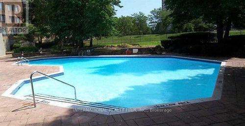 106 - 55 Bamburgh Circle, Toronto, ON - Outdoor With In Ground Pool With Backyard