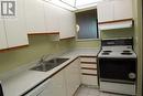 106 - 55 Bamburgh Circle, Toronto, ON  - Indoor Photo Showing Kitchen With Double Sink 