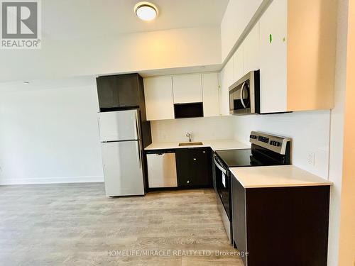 204 - 202 Burnhamthorpe Road, Mississauga, ON - Indoor Photo Showing Kitchen With Stainless Steel Kitchen