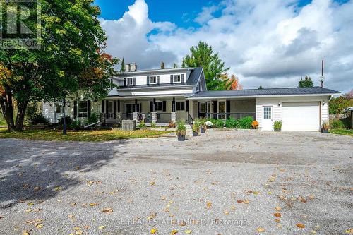 510 County Road 36, Galway-Cavendish And Harvey, ON - Outdoor With Deck Patio Veranda With Facade