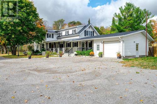 510 County Road 36, Galway-Cavendish And Harvey, ON - Outdoor With Deck Patio Veranda With Facade